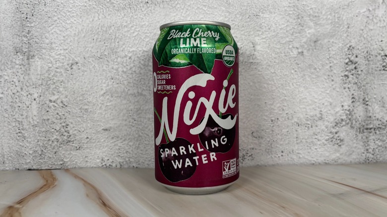 Can of Black Cherry Lime Nixie sparkling water on table