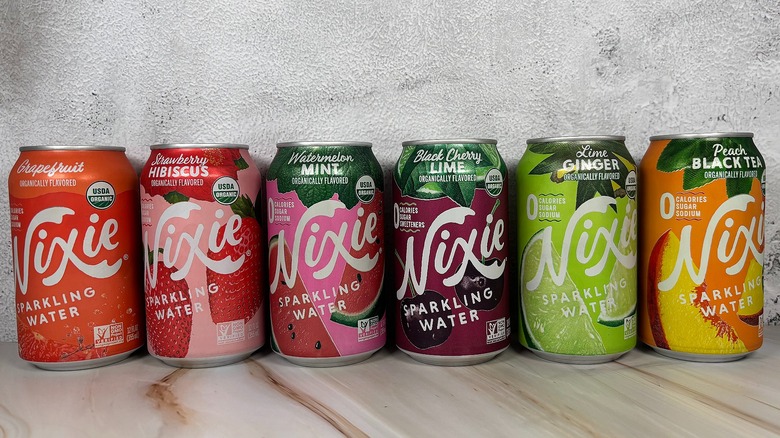 Six flavors of Nixie sparkling water on table