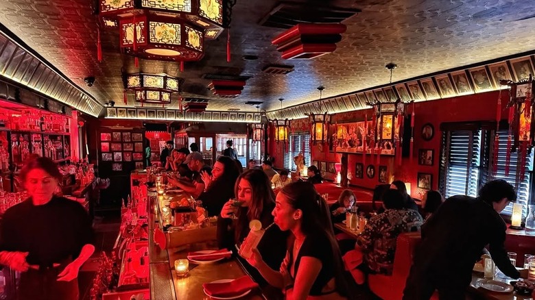 People eating and drinking in The Formosa Cafe