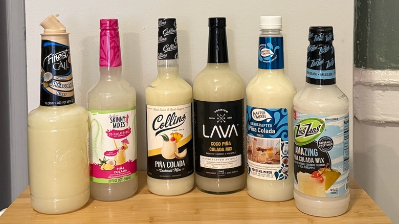 six different bottles of piña colada mixers
