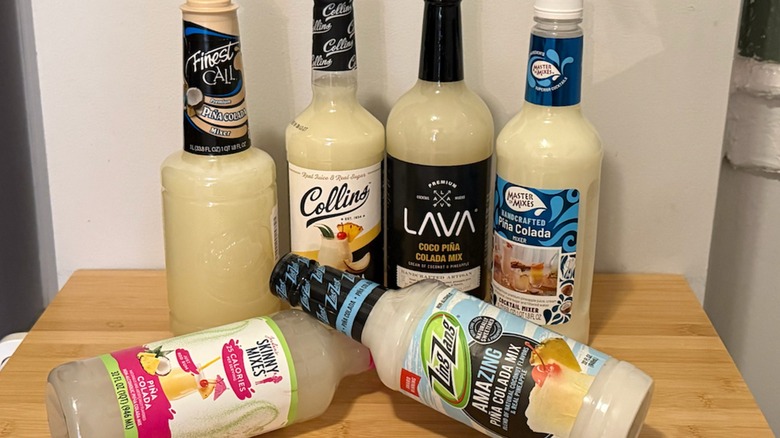 multiple bottles of piña colada mixers