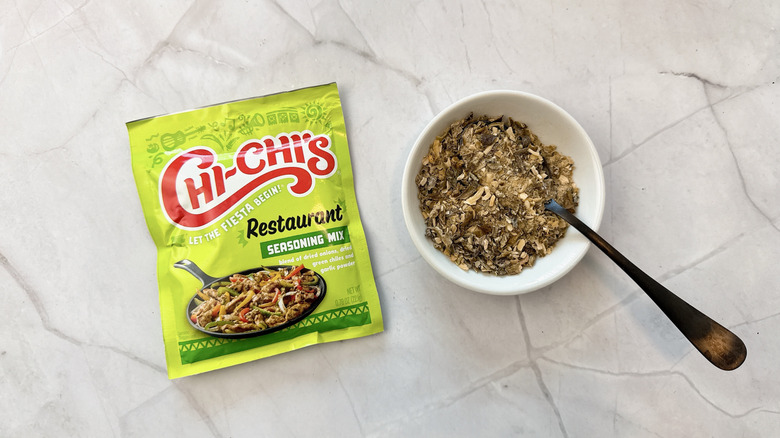 Seasoning container with bowl and a spoon