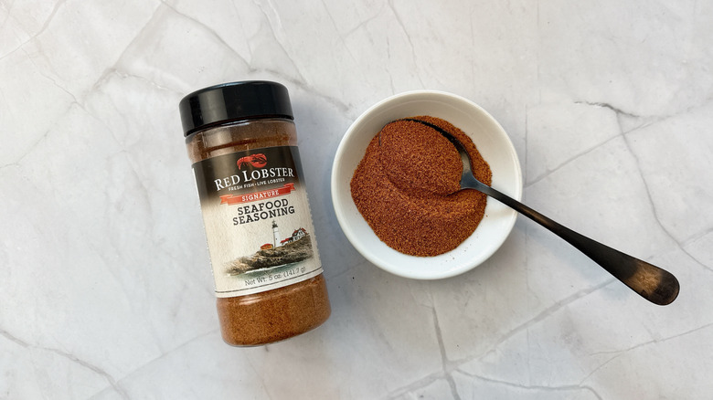 Seasoning container with bowl and a spoon