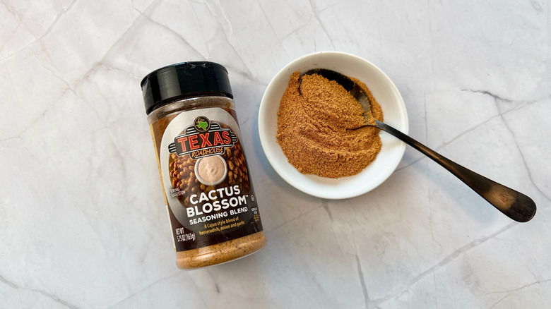 Seasoning container with bowl and a spoon