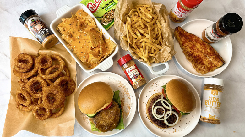 variety of foods with seasonings alongside