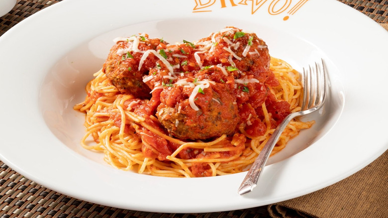 Spaghetti and Meatballs on a plate that says 'Bravo!'