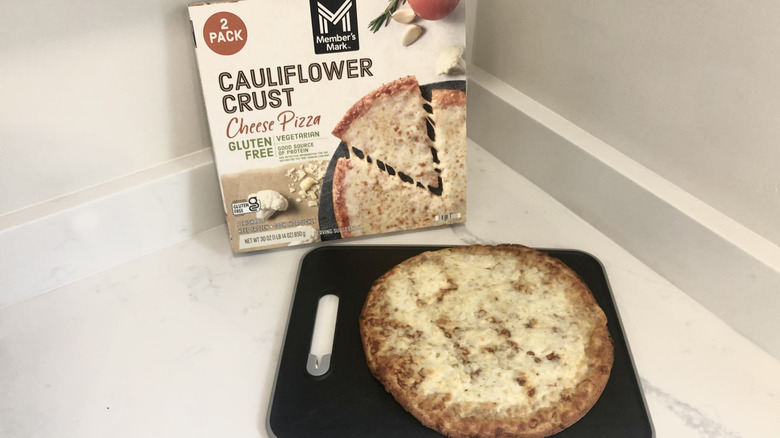 Member's Mark Cauliflower Crust Pizza on cutting board.