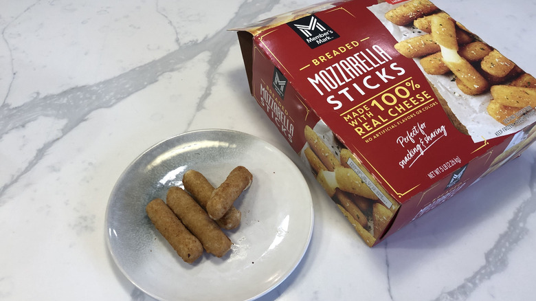 Member's Mark mozzarella sticks on a plate.