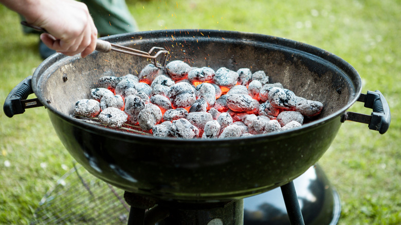 Potbelly grill filled with hot charcoals