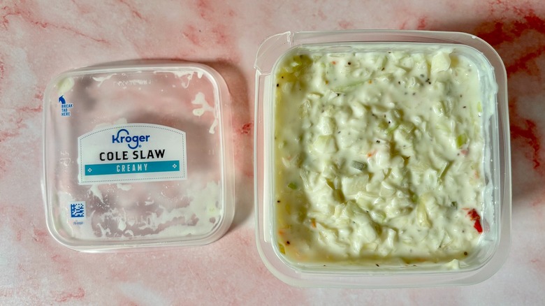 Kroger coleslaw container next to lid on pink surface