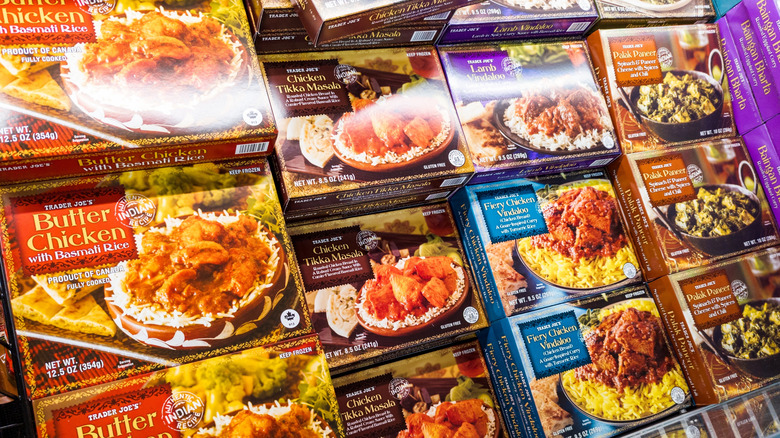 Selection of ready-to-heat Indian foods in a Trader Joe's freezer case