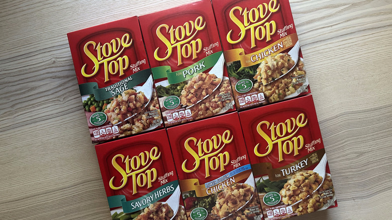 Boxes of Stove Top stuffing arranged on wooden table
