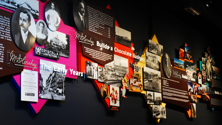 Wall of informational signs and photos inside Hershey museum