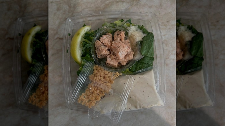 Trader Joe's Caesar Salad with Salmon on countertop