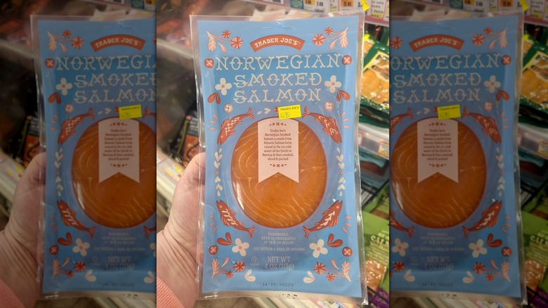 Hand holding package of Trader Joe's Norwegian Smoked Salmon