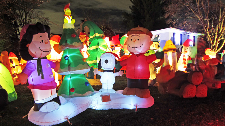 Charlie Brown Christmas inflatable decorations in yard