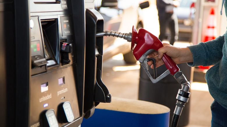 Person filling their car with gas at Costco gas station