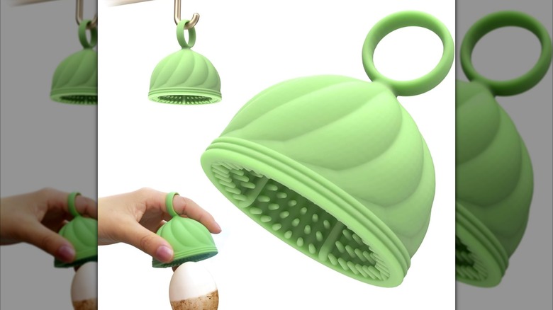 DoID Tag Store Egg Washer shown via a close up, hanging from a cup, and being used to clean an egg