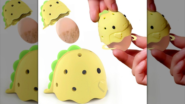 A person using Mosophy Silicone Egg Washer to clean an egg