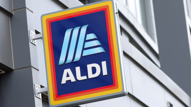 Aldi sign hanging from store