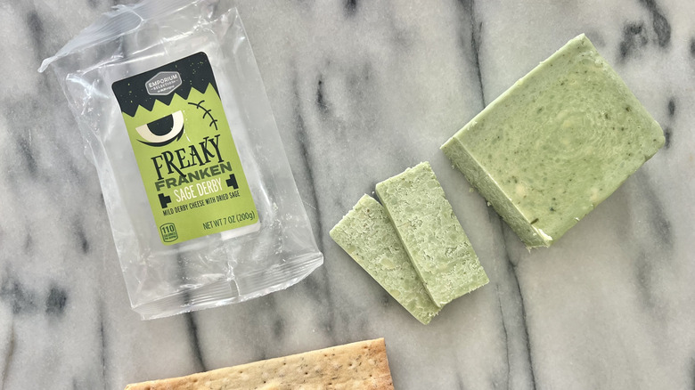 Aldi Freaky Franken Sage Derby Cheese cut on cheese board.