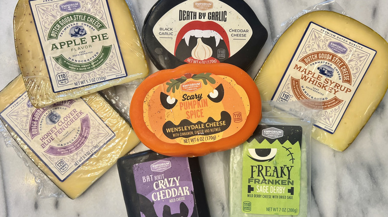 7 different Aldi fall cheeses on cheese board.
