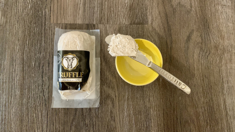 Aldi truffle goat cheese log on table