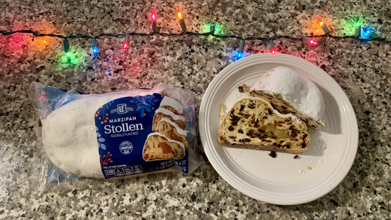 Aldi Marzipan stollen on plate with christmas lights