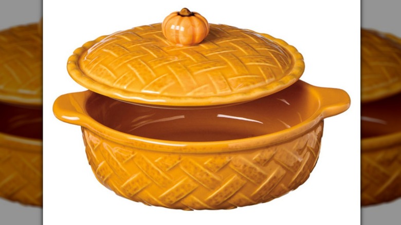 Covered orange baking dish with pumpkin for top handle and lattice pattern