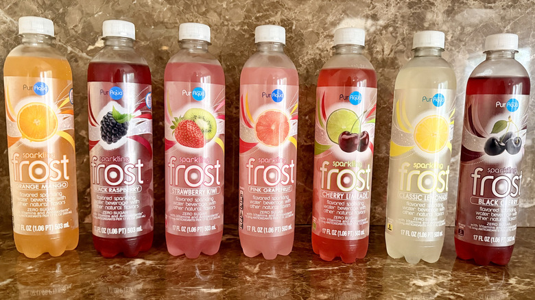 Aldi PurAqua Sparkling Frost Water bottles lined up in a row