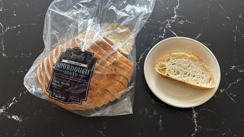 Aldi Specially Selected sourdough bread next to slice on plate