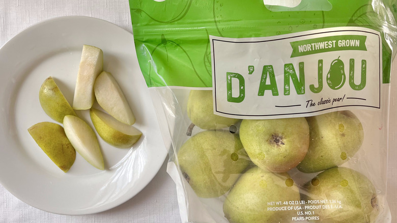 Bag of pears and fruit on a plate