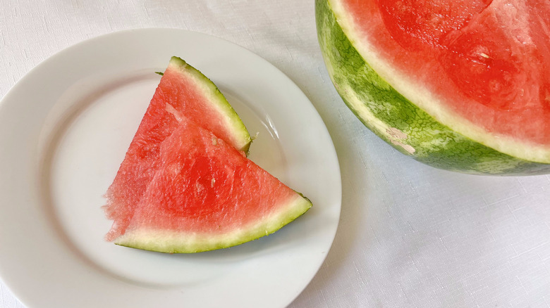Watermelon slices on a white plate
