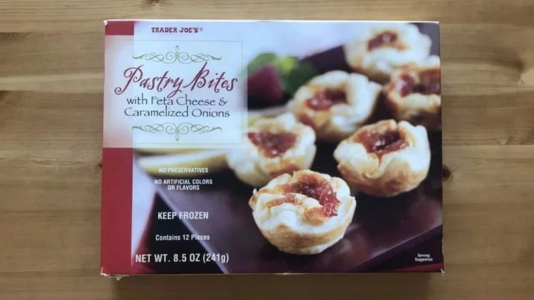 Trader Joe's Pastry Bites with Feta Cheese and Caramelized Onions on wooden table