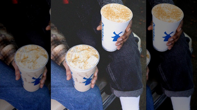 People holding hot and iced chai drinks