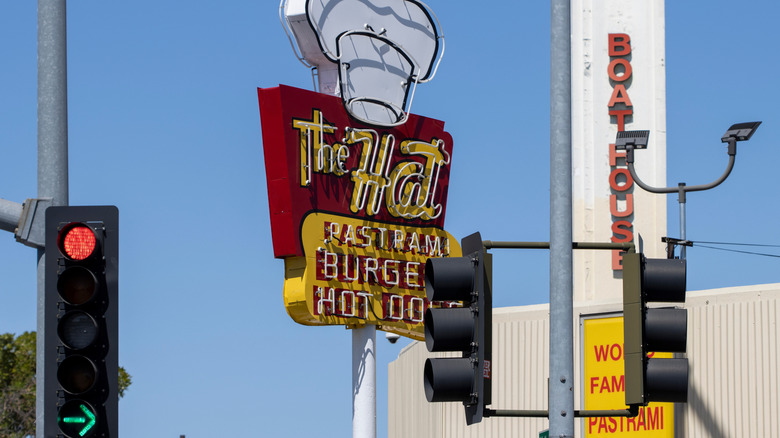 Neon sign for The Hat world famous pastrami
