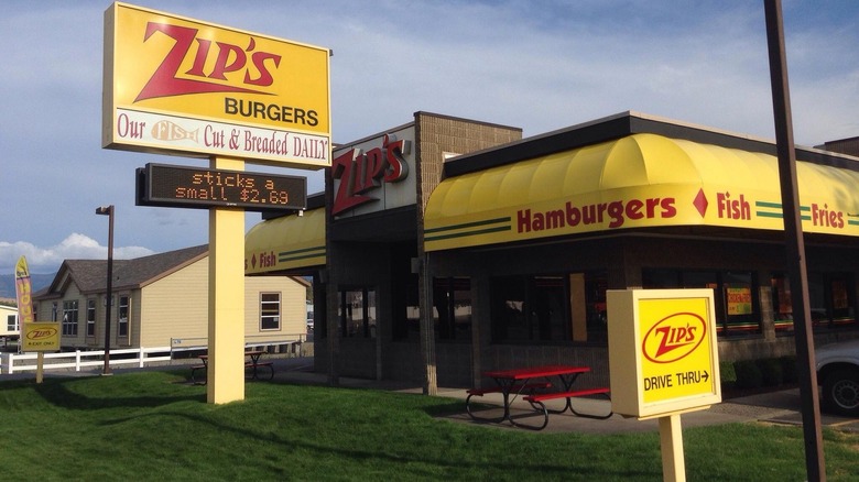 Zips drive-in exterior with a drive thru sign