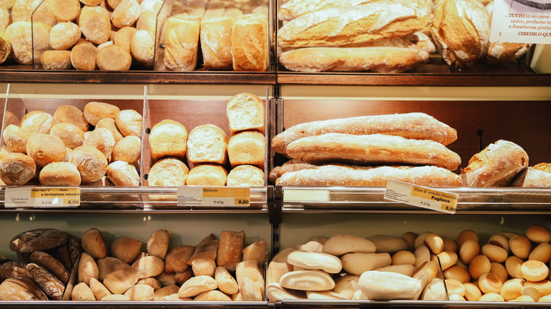 Bread arranged in display at bakery