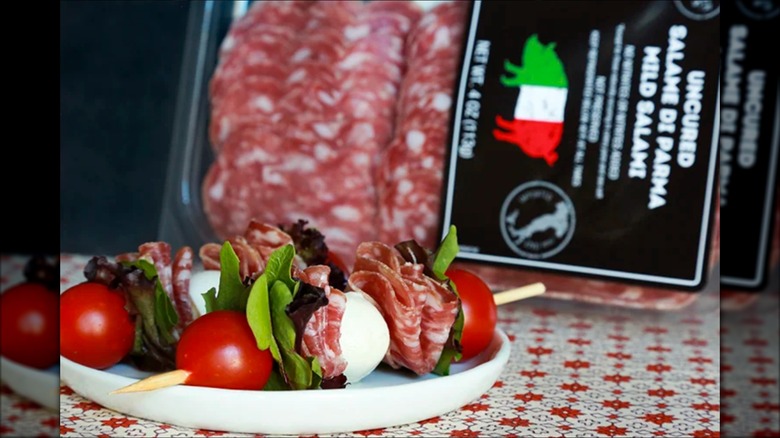 Salame di Parma Mild Salami skewers with tomato on a plate