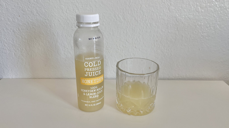Honeydew Cold-Pressed Juice bottle and juice in a glass