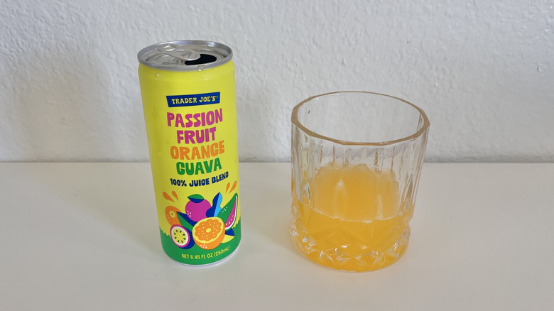 Passion Fruit Orange Guava Juice Blend can and juice in a glass