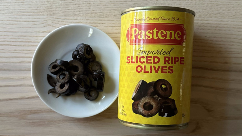 Pastene black olives on small white plate