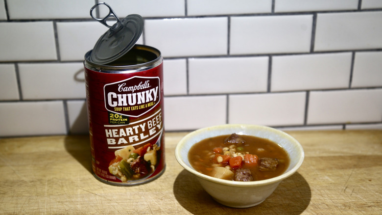 Campbell's chunky hearty beef barley soup can and. bowl
