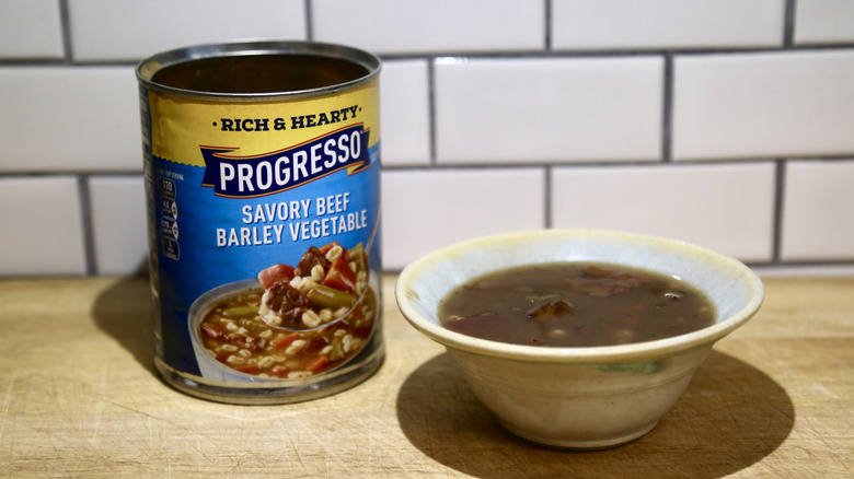 Progresso savory beef barley vegetable soup can and bowl
