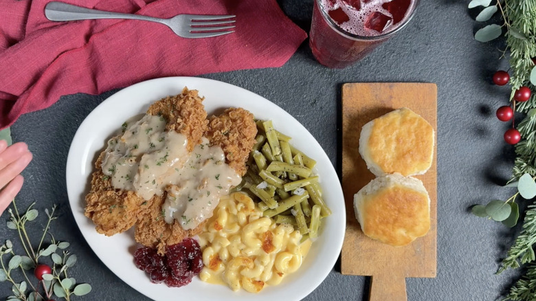 Large Cracker Barrel holiday meal with biscuits