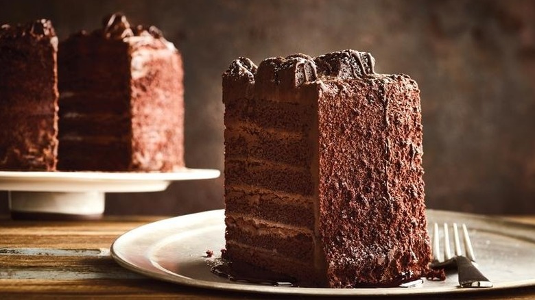 A slice of Outback Steakhouse's Chocolate Tower sits on plate