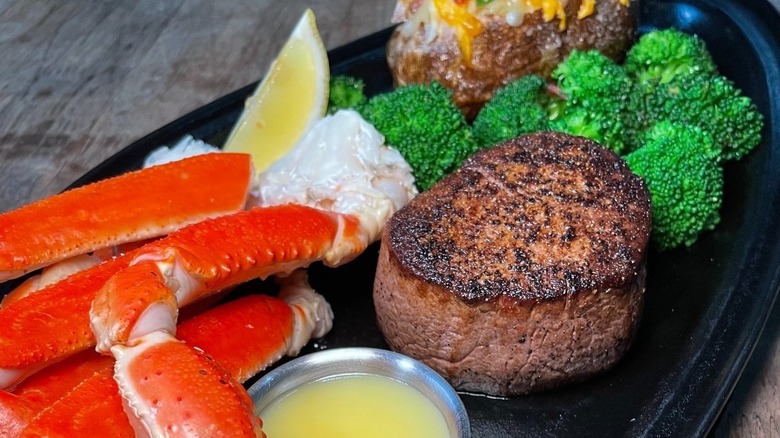 Barrel-Cut filet with crab legs and broccoli