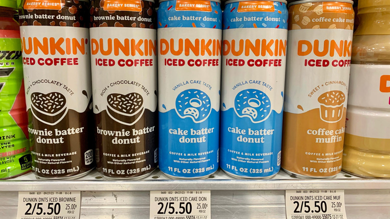 Dunkin' drinks with price tags underneath them at Publix store