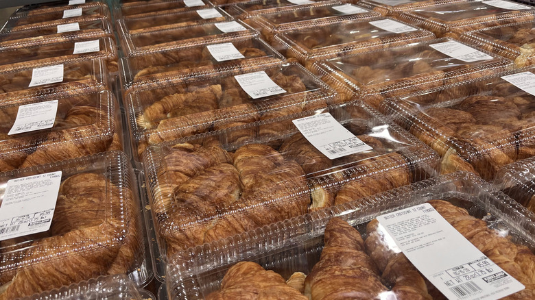 Packages of Costco's croissants arranged on table