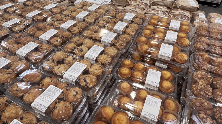 Packs of muffins from Costco arranged on table